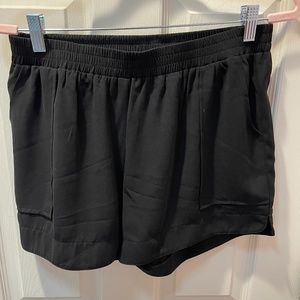 Joy Joy Black Shorts with pockets. Size Large.